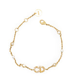 CHRISTIAN DIOR Clair D Lune Bracelet Gold-Finish Metal White Resin Pearls and Sparkling Crystals 