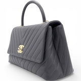Chanel Caviar Chevron Quilted Medium Coco Handle Flap Black 
