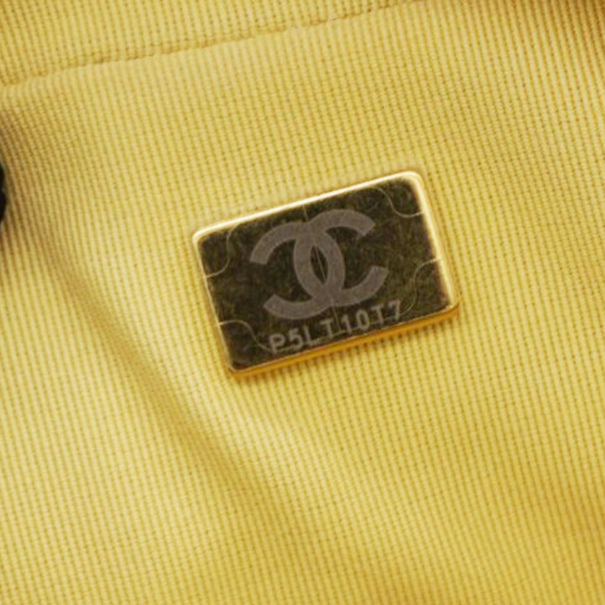 Chanel Shiny Caviar Quilted Chain Melody Backpack Yellow 