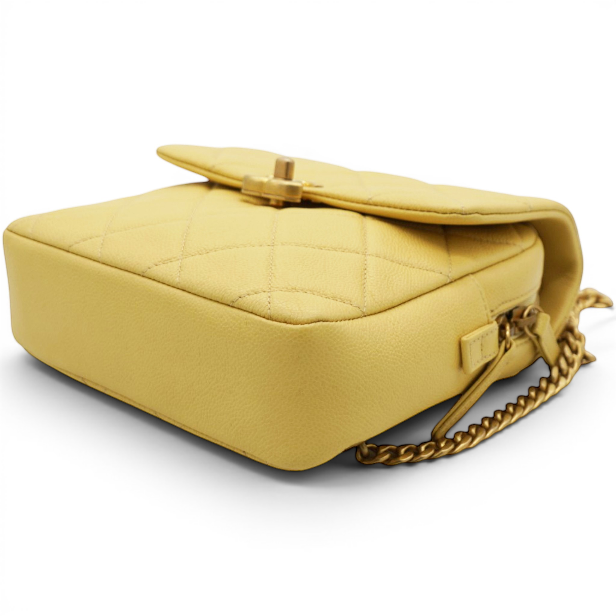 Chanel Shiny Caviar Quilted Chain Melody Backpack Yellow 
