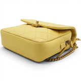 Chanel Shiny Caviar Quilted Chain Melody Backpack Yellow 