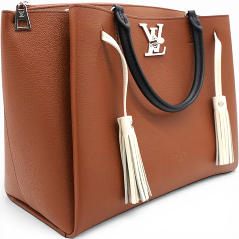 LOUIS VUITTON Lockmeto Brown Caramel Black and White Leather Tassel Tote Bag 