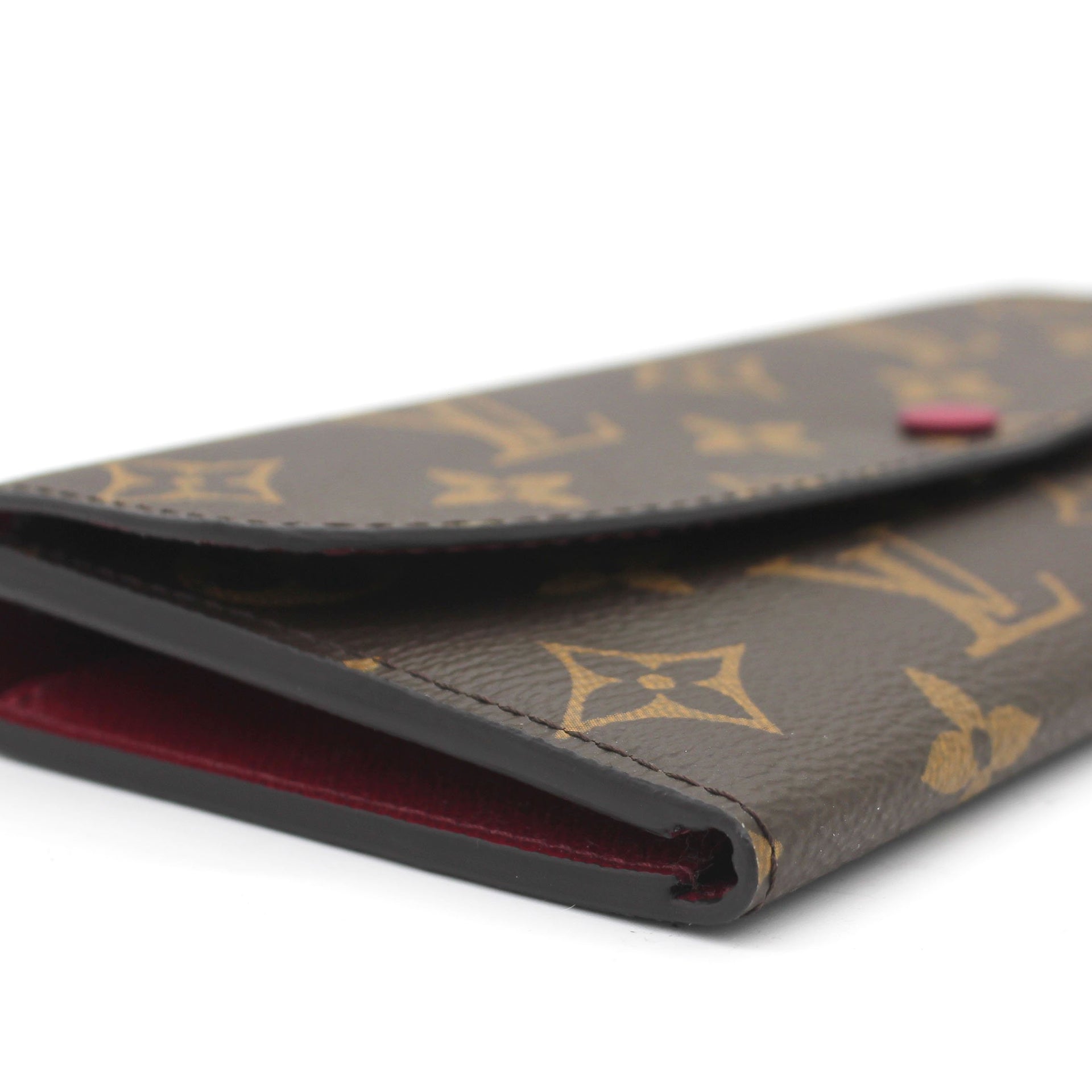 Louis Vuitton Emilie Wallet in fuchsia. Love it - and it holds my iPhone 6.  Lovely wallet!